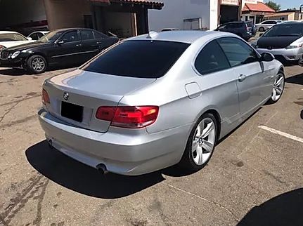 Silver sedan after rear collision repair